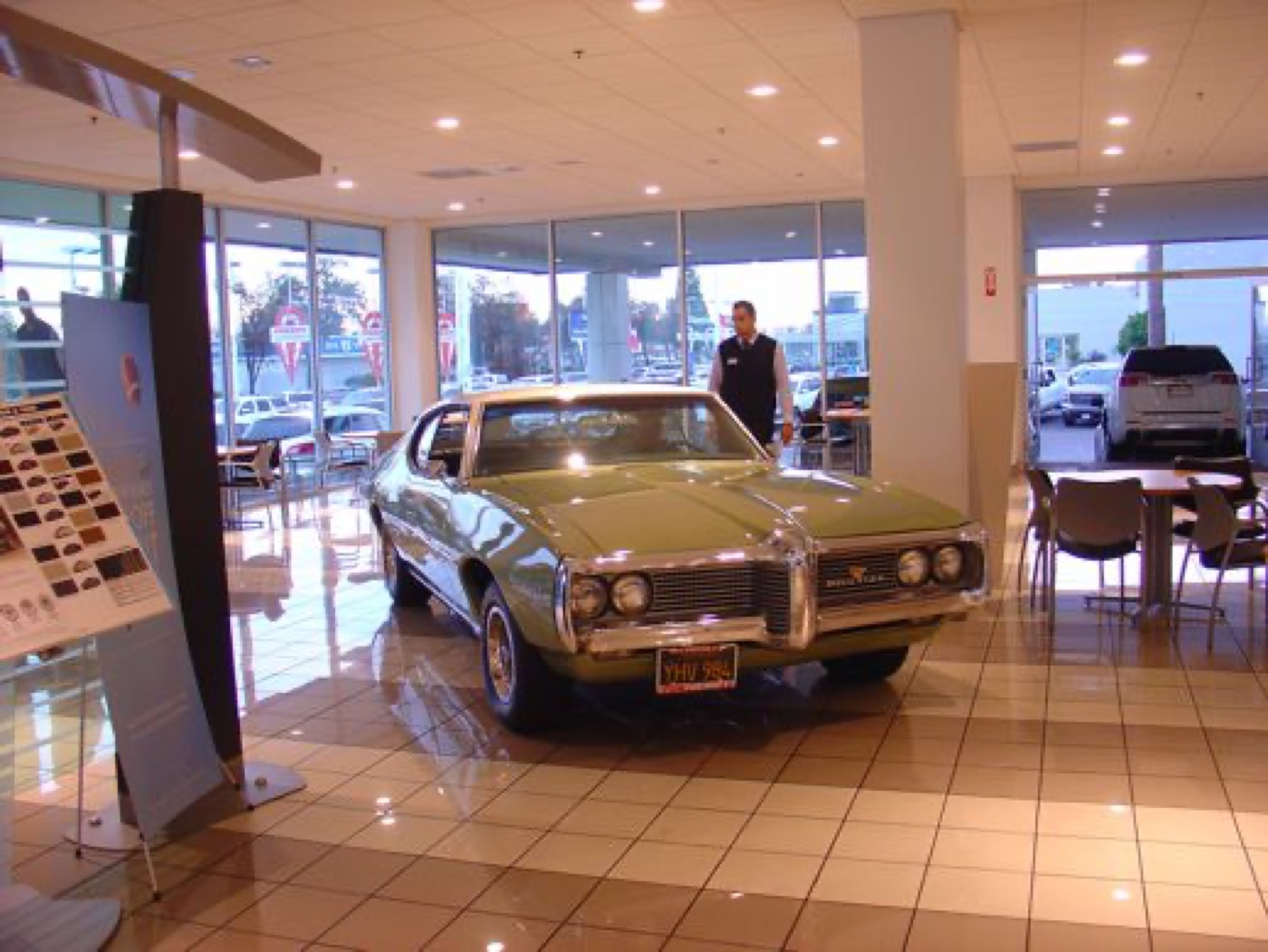 Green GTO front view, showroom centerpiece