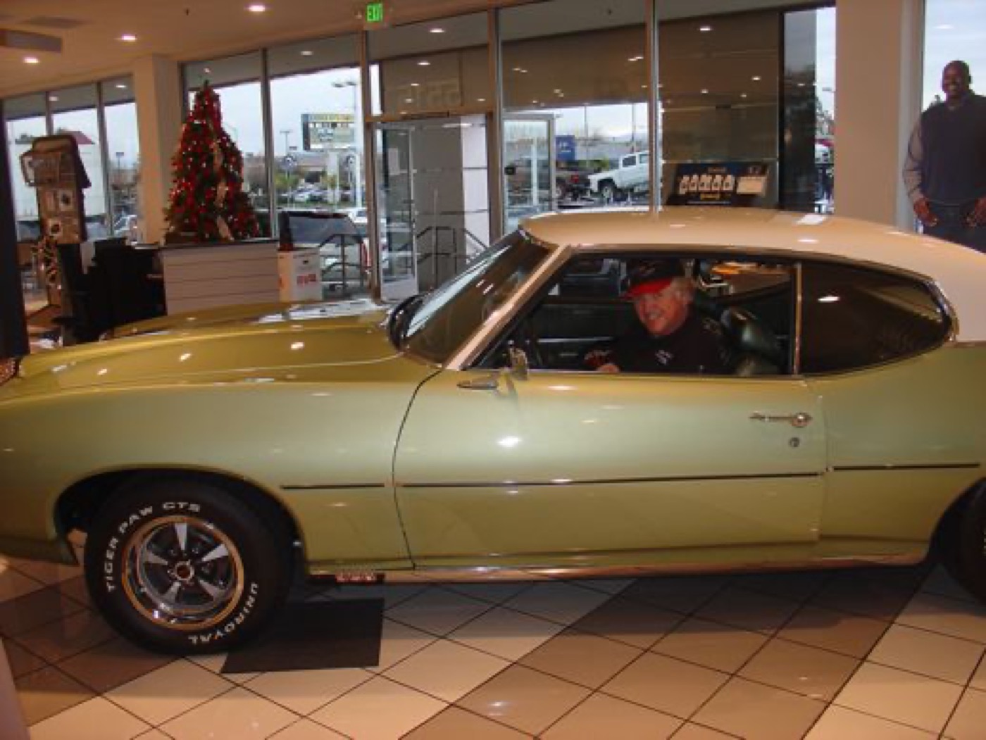 Green GTO hardtop, classic muscle profile
