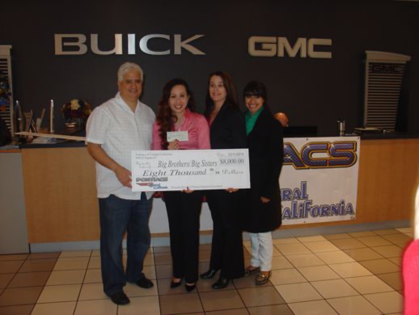 Club presents eight-thousand-dollar Big Brothers check