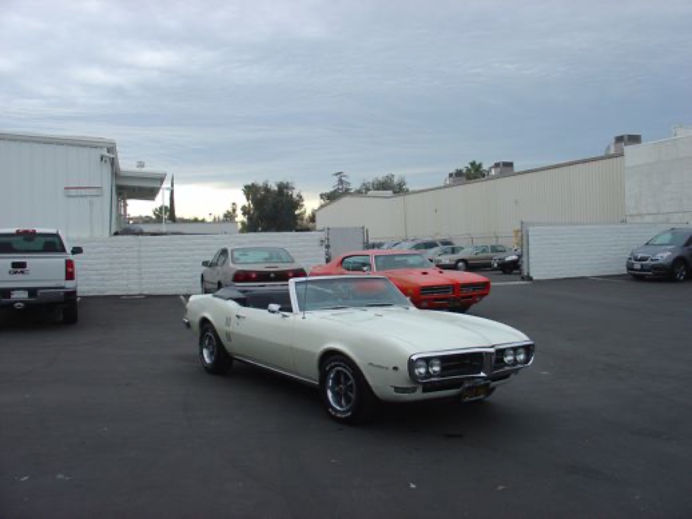 Cream Firebird convertible in the lot