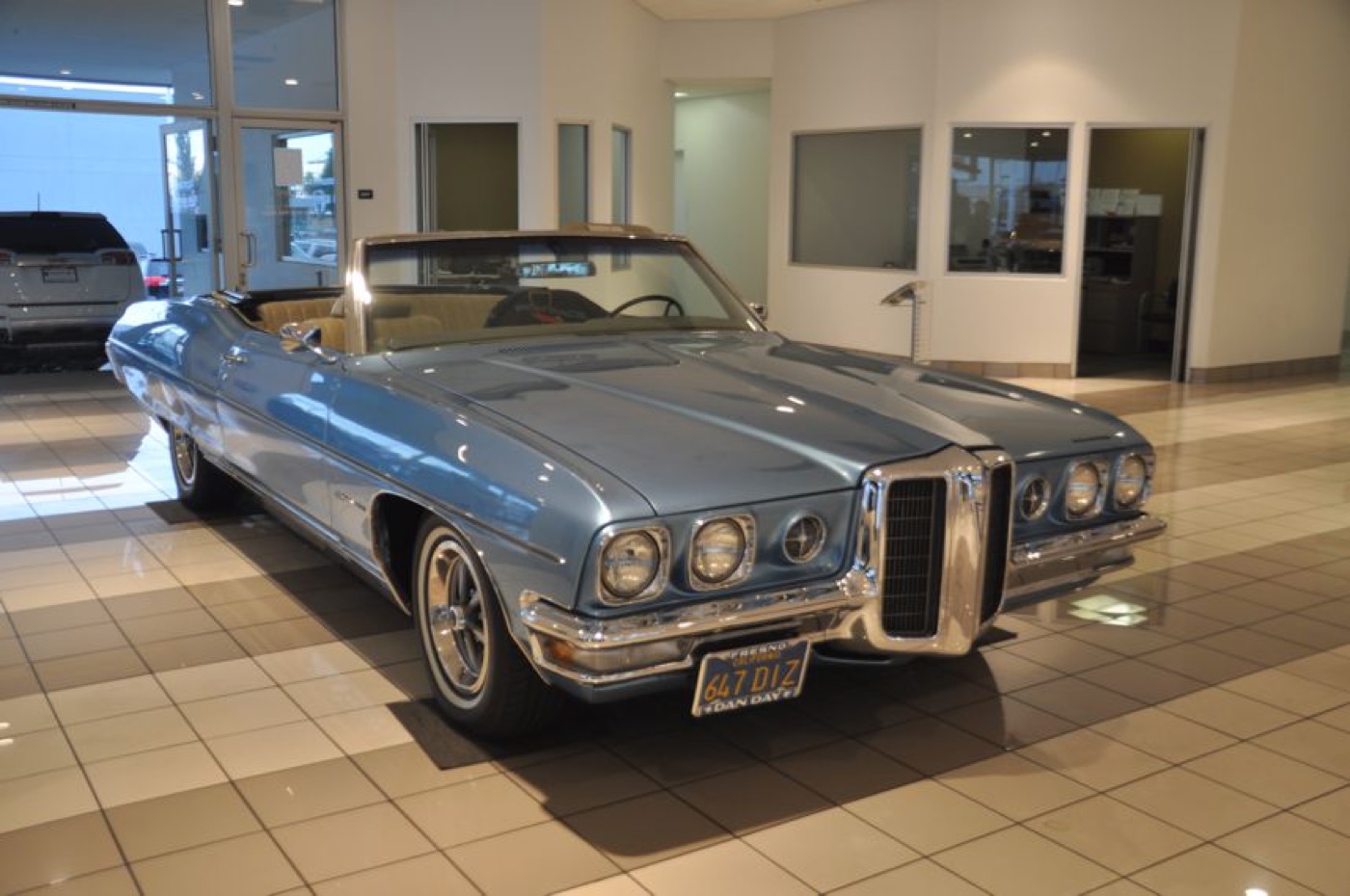 Stunning blue convertible on showroom display