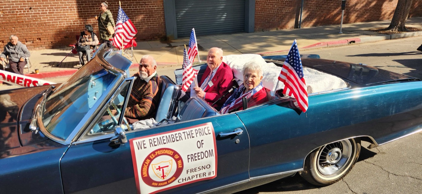 Veterans riding in the freedom remembrance convertible